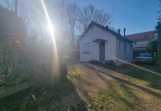 Maisonnette avec jardin et parking